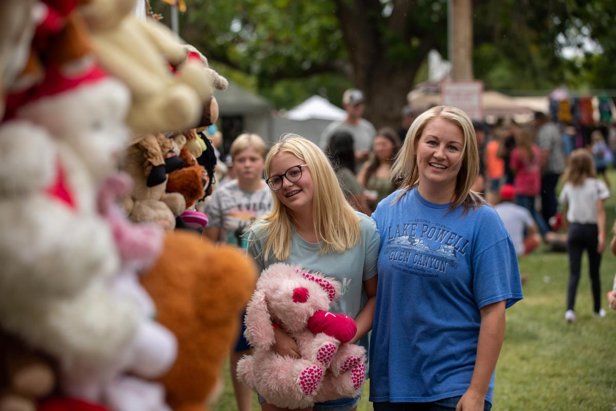 Woman looking at stuffed animals