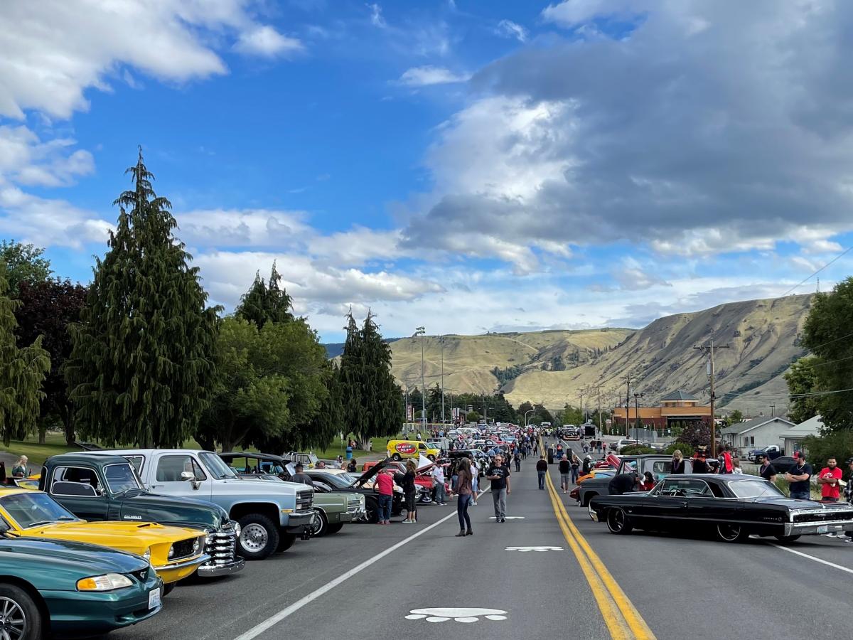 View of cars lining up for the parade on each side of Georgia Avenue.