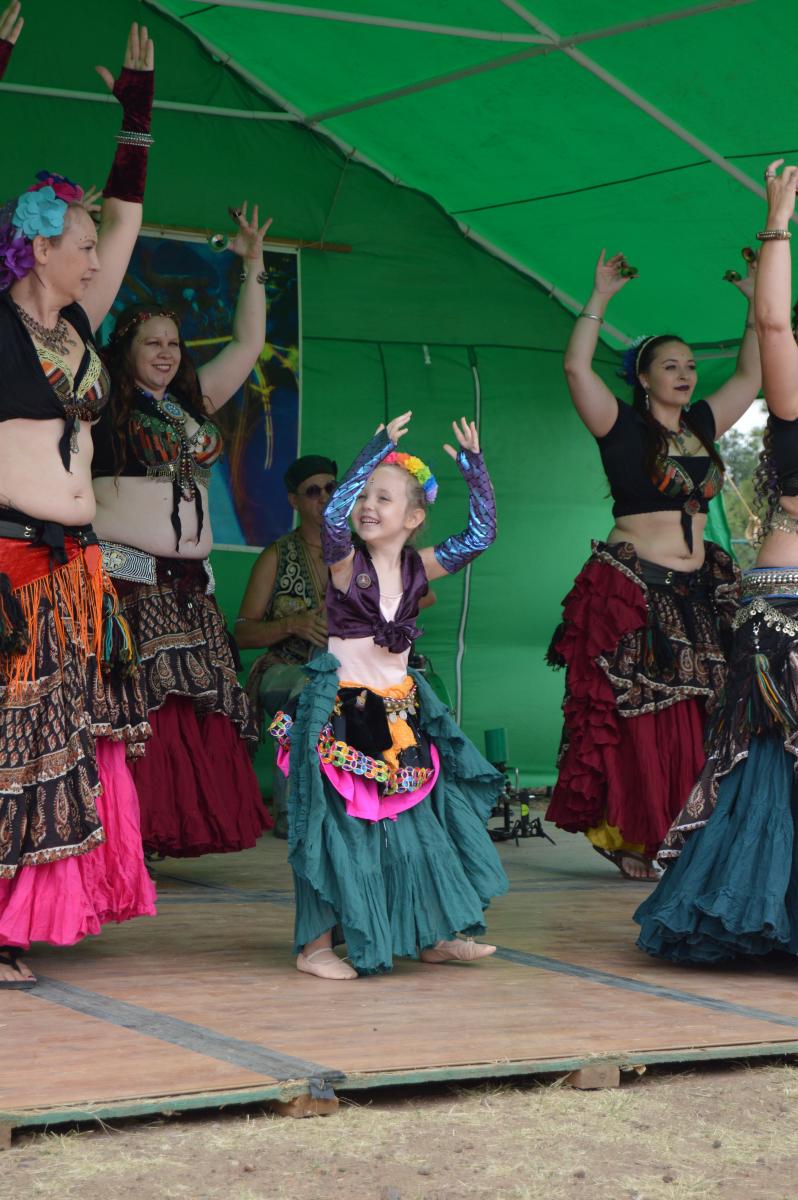 Young girl, about 5 years old belly dancing on stage at Mediaeval Mayhem Renaissance Faire