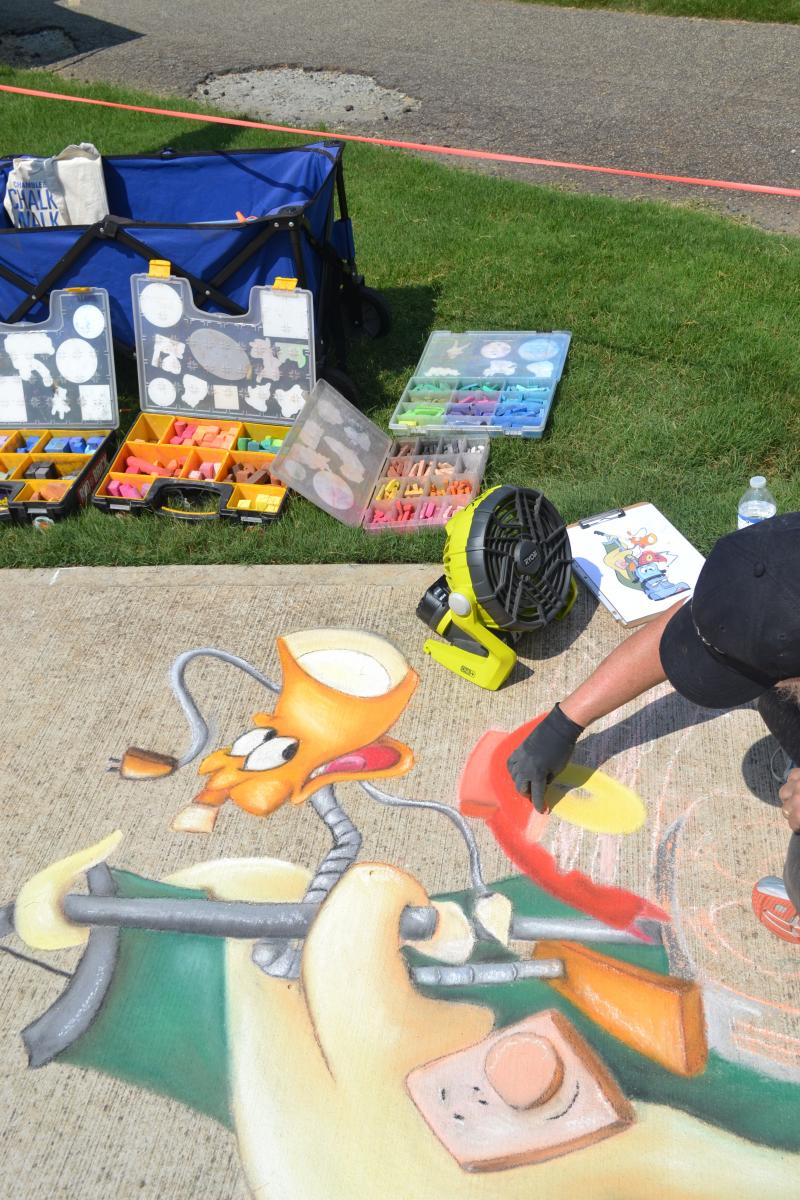 Artist at work at the 2022 Chalk Walk