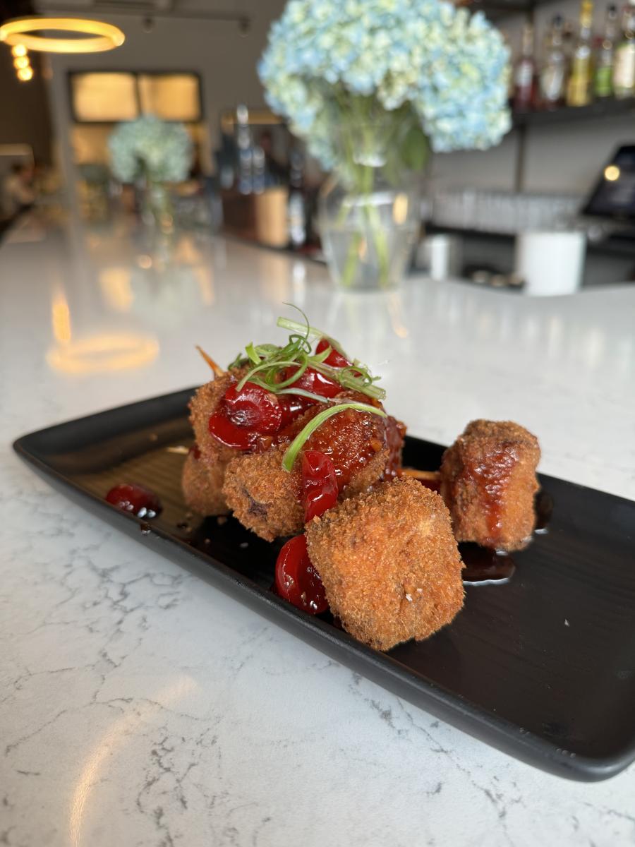 Kinjo's Pork Belly Bites with maraschino hoisin bbq sauce