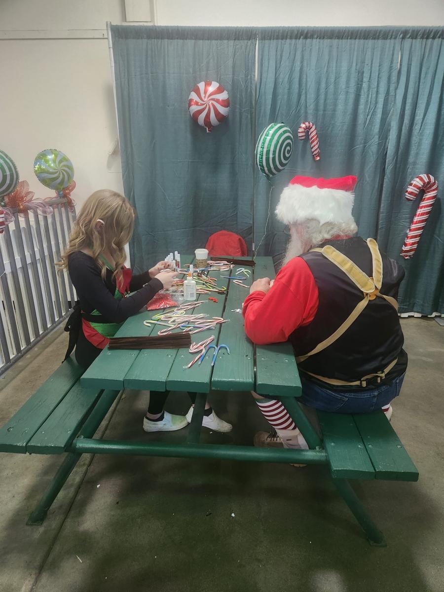 Santa and his elf B preparing for the day!