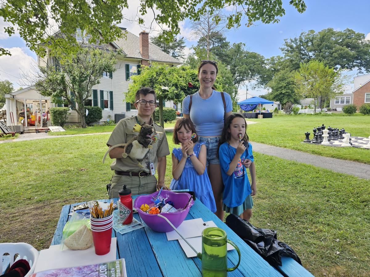 Holt Park Naturalist Mel Tilley with a happy family