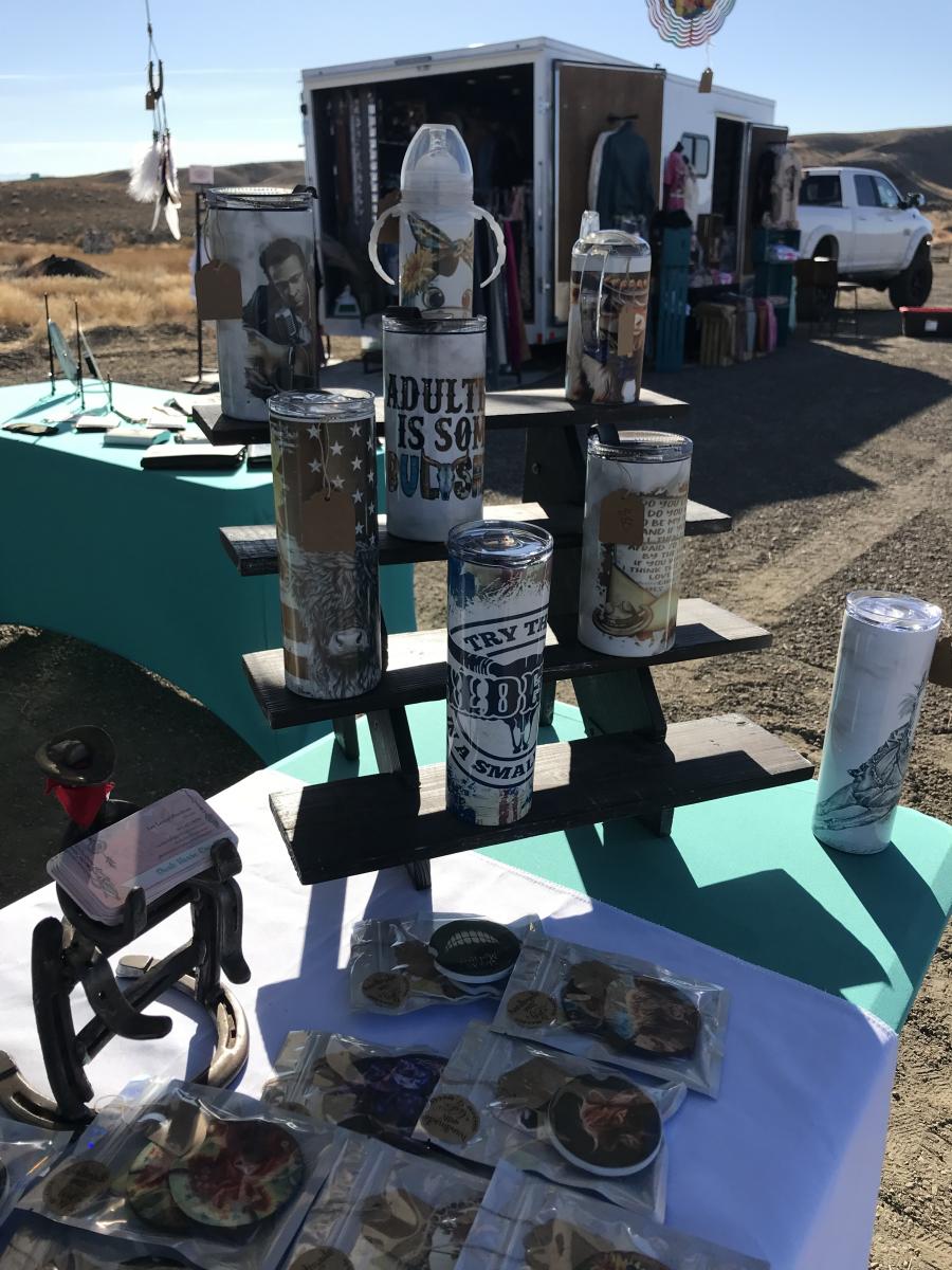 western tumblers at a vendor shop