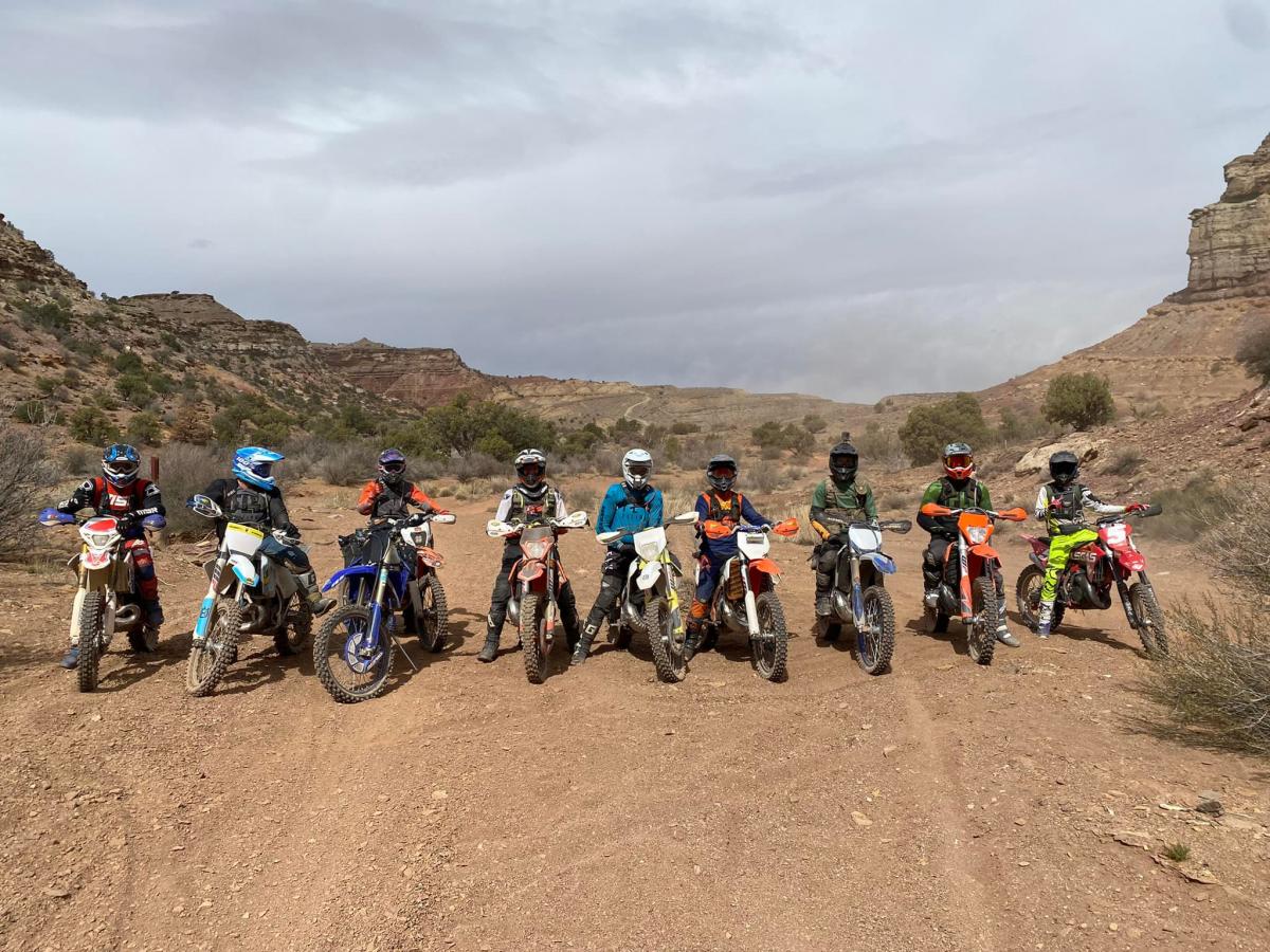 Group of Dirt Bikes and riders on trail