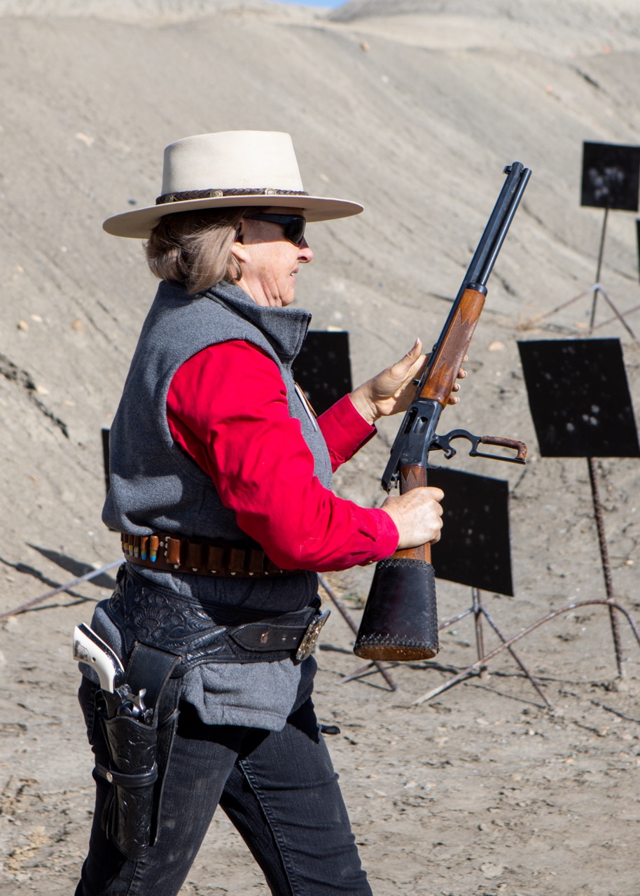 woman carrying gun