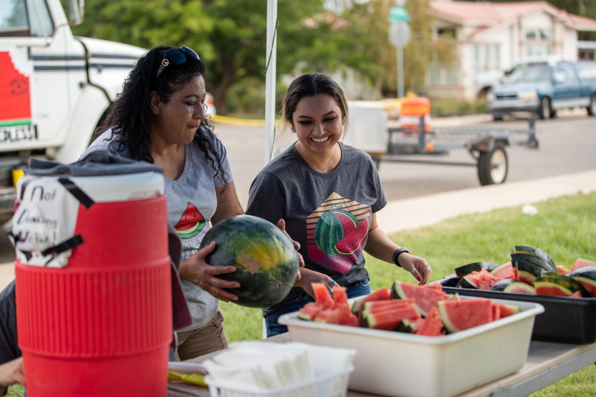 Farmers serving Watermelons