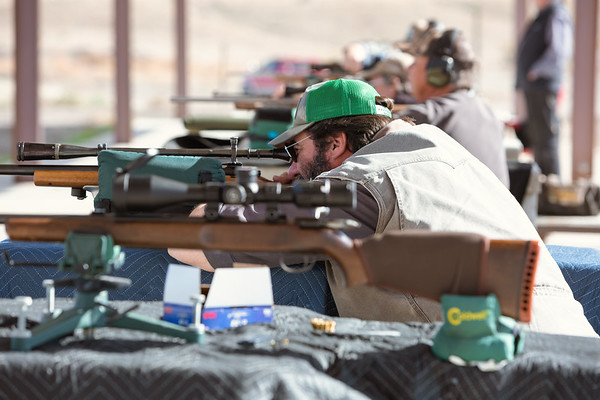 man shooting a gun