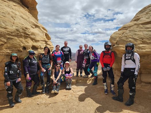 group of riders on trail