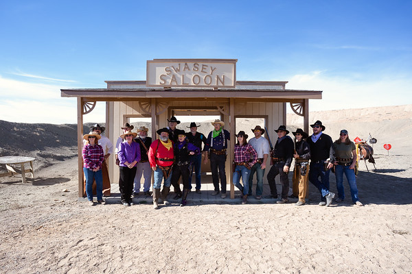 posse in front of facade building