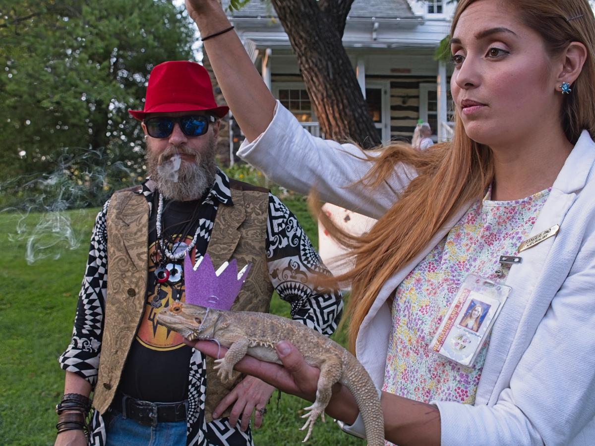 Mark, our curator, with naturalist  Paola and her lizard friend