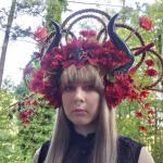 Fantasy red and black floral headdress with horns and bird skulls