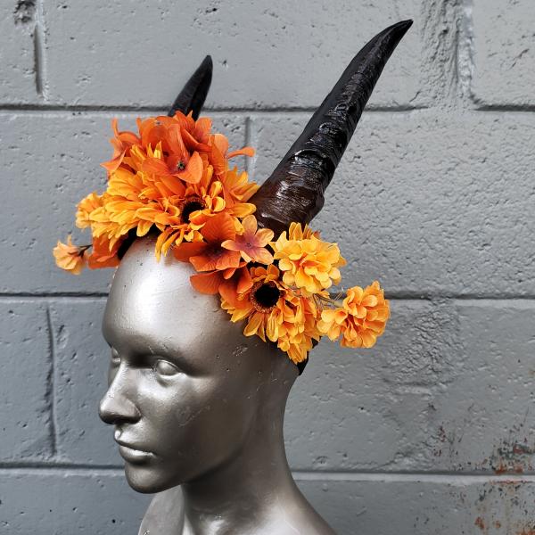 Orange floral headdress with horns picture