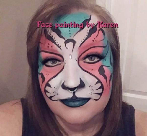 Color Craze face painting by Karen