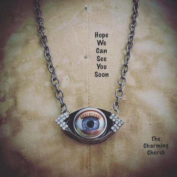 Blinking doll eye necklace picture