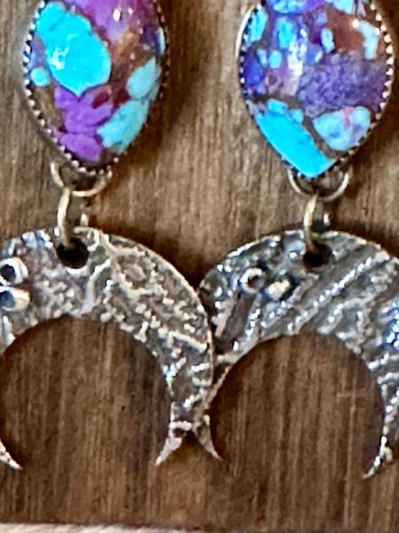 Long Mohave turquoise and silver earrings with hanging coral textured moons. Purple and turquoise silver drop earrings. Coral moon earrings. picture