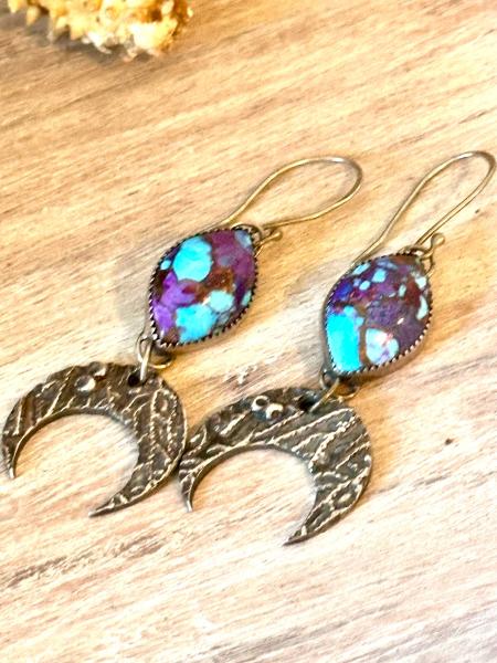 Long Mohave turquoise and silver earrings with hanging coral textured moons. Purple and turquoise silver drop earrings. Coral moon earrings. picture